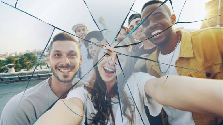 Group Selfie Shown Through A Cracked Phone Screen For Ifixandrepair Jupiter Florida Phone Repair.