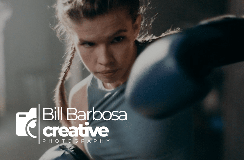 Female Boxer Throwing A Punch In A Dramatic Action Image For The Take Your Best Shot Photography Campaign.